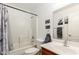 Bathroom with shower/tub combo and updated vanity at 18907 N Vemto St, Maricopa, AZ 85138