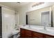 Bathroom with double vanity, tub, and shower at 18907 N Vemto St, Maricopa, AZ 85138