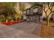 Two story home with attached garage and red rock landscaping at 18907 N Vemto St, Maricopa, AZ 85138