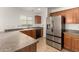 Modern kitchen with stainless steel appliances and ample counter space at 18907 N Vemto St, Maricopa, AZ 85138