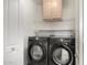 Laundry room with Samsung washer and dryer at 18907 N Vemto St, Maricopa, AZ 85138