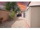 Backyard featuring rock landscaping, block wall, and shed at 2073 E Wildhorse Dr, Chandler, AZ 85286