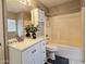 Cozy bathroom featuring a vanity sink, medicine cabinet, and a shower-tub combo at 2073 E Wildhorse Dr, Chandler, AZ 85286