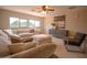 Large bonus room featuring cozy seating, neutral tones, and natural light at 2073 E Wildhorse Dr, Chandler, AZ 85286