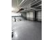 Spacious garage with overhead storage and epoxy floor at 2073 E Wildhorse Dr, Chandler, AZ 85286