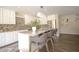 Spacious kitchen featuring granite countertops, stainless steel appliances, and a large island with seating at 2073 E Wildhorse Dr, Chandler, AZ 85286
