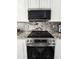 Modern kitchen featuring stainless steel appliances and granite countertops at 2073 E Wildhorse Dr, Chandler, AZ 85286