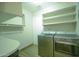 Well-organized laundry room featuring modern washer and dryer at 2073 E Wildhorse Dr, Chandler, AZ 85286