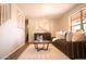 Inviting living room featuring stylish decor, a comfortable couch, and ample natural light at 2073 E Wildhorse Dr, Chandler, AZ 85286