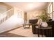 Comfortable living room with wood flooring, neutral decor, and plenty of natural light at 2073 E Wildhorse Dr, Chandler, AZ 85286