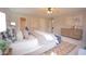 Cozy main bedroom featuring a neutral color palette, modern furnishings, and natural light at 2073 E Wildhorse Dr, Chandler, AZ 85286