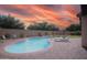 Inviting backyard pool with lounge chairs and a spacious brick patio for outdoor relaxation and entertaining at 2073 E Wildhorse Dr, Chandler, AZ 85286