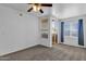 Bright bedroom featuring neutral carpeting, a large window and a balcony at 2134 E Broadway Rd # 2033, Tempe, AZ 85282