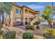 Inviting condo building featuring well-manicured landscaping and ample parking at 2134 E Broadway Rd # 2033, Tempe, AZ 85282