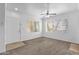 Inviting living room featuring new carpet, fresh paint, and ample natural light at 2134 E Broadway Rd # 2033, Tempe, AZ 85282