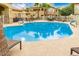 Community pool featuring lounge chairs and table seating for residents enjoyment in the Arizona sunshine at 2134 E Broadway Rd # 2033, Tempe, AZ 85282