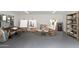 Studio offers ample space and natural light for creativity, showcasing easels, art supplies, and wall art at 2217 N 79Th St, Scottsdale, AZ 85257
