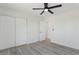 Bedroom features light gray floors, white walls, and a door to an adjacent room at 2217 N 79Th St, Scottsdale, AZ 85257