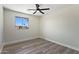 Bright bedroom with a view from the window showing palm trees outside at 2217 N 79Th St, Scottsdale, AZ 85257