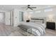 Bright and airy bedroom with large bed, neutral decor, and ample natural light at 2217 N 79Th St, Scottsdale, AZ 85257