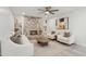 Inviting living room with a brick fireplace, modern furnishings and neutral decor at 2217 N 79Th St, Scottsdale, AZ 85257