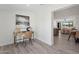 Bright home office with desk and chair; living spaces visible through doorway at 2217 N 79Th St, Scottsdale, AZ 85257