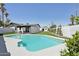 Backyard oasis with a refreshing pool and lush landscaping at 2217 N 79Th St, Scottsdale, AZ 85257