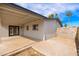 Covered back patio featuring ample space, perfect for outdoor entertaining and relaxation at 2227 W Paradise Dr, Phoenix, AZ 85029