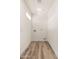 Functional laundry room featuring wood-look flooring and connections for washer and dryer at 2227 W Paradise Dr, Phoenix, AZ 85029