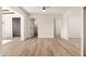 Spacious living room featuring new hardwood floors and ample lighting at 2227 W Paradise Dr, Phoenix, AZ 85029