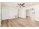 Spacious living room with new hardwood floors, and open floor plan at 2227 W Paradise Dr, Phoenix, AZ 85029