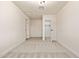 Unfurnished room featuring new carpeting and a closet at 2227 W Paradise Dr, Phoenix, AZ 85029