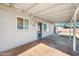 The covered patio area offers shade and protection from the elements at 2527 N 69Th Pl, Scottsdale, AZ 85257