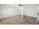 Open-concept living area featuring hardwood floors and neutral wall paint at 2527 N 69Th Pl, Scottsdale, AZ 85257
