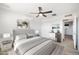 Comfortable bedroom featuring a ceiling fan, neutral colors, and carpet at 2527 N 69Th Pl, Scottsdale, AZ 85257
