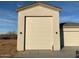 Spacious two-car garage with extra storage space at 28304 N 220Th Ave, Wittmann, AZ 85361