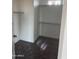 Spacious walk-in closet with shelving and hanging rods at 28304 N 220Th Ave, Wittmann, AZ 85361