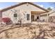 Well maintained backyard with a covered patio and desert landscaping at 2865 E Cathy Dr, Gilbert, AZ 85296