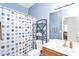 Functional bathroom with a toilet, sink, and shower/tub combination, featuring updated fixtures and a clean design at 2865 E Cathy Dr, Gilbert, AZ 85296