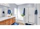 Bright bathroom with a soaking tub, stand up shower, dual sink vanity, and refreshing natural light at 2865 E Cathy Dr, Gilbert, AZ 85296
