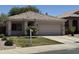 Beautiful single-story home with a well-manicured lawn and a two-car garage at 2865 E Cathy Dr, Gilbert, AZ 85296