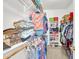 Spacious walk-in closet with ample shelving and hanging space, perfect for organized storage of clothing and accessories at 2865 E Cathy Dr, Gilbert, AZ 85296