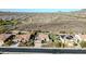Property featuring solar panels on the roof and desert views surrounding the home at 30696 N 130Th Ln, Peoria, AZ 85383