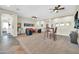 Spacious open living area with high ceilings, ceiling fans, and neutral color palette at 30696 N 130Th Ln, Peoria, AZ 85383