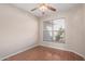 Well lit bedroom with laminate flooring and a window with blinds at 3427 E Waterview Dr, Chandler, AZ 85249