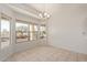 Bright dining area with large windows and tile floors at 3427 E Waterview Dr, Chandler, AZ 85249