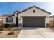 Charming single-Gathering home showcasing a well-maintained front yard and a two-car garage at 3508 N Preston St, Casa Grande, AZ 85122