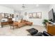 Bright and airy living room featuring modern furnishings and desert-themed wall decor at 3508 N Preston St, Casa Grande, AZ 85122