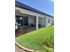 Spacious backyard with covered patio and artificial turf at 39190 N Kaden Ln, San Tan Valley, AZ 85140