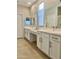 Elegant bathroom with double vanity and stylish fixtures at 39190 N Kaden Ln, San Tan Valley, AZ 85140